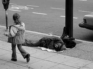 300px-man_sleeping_on_canadian_sidewalk.jpg